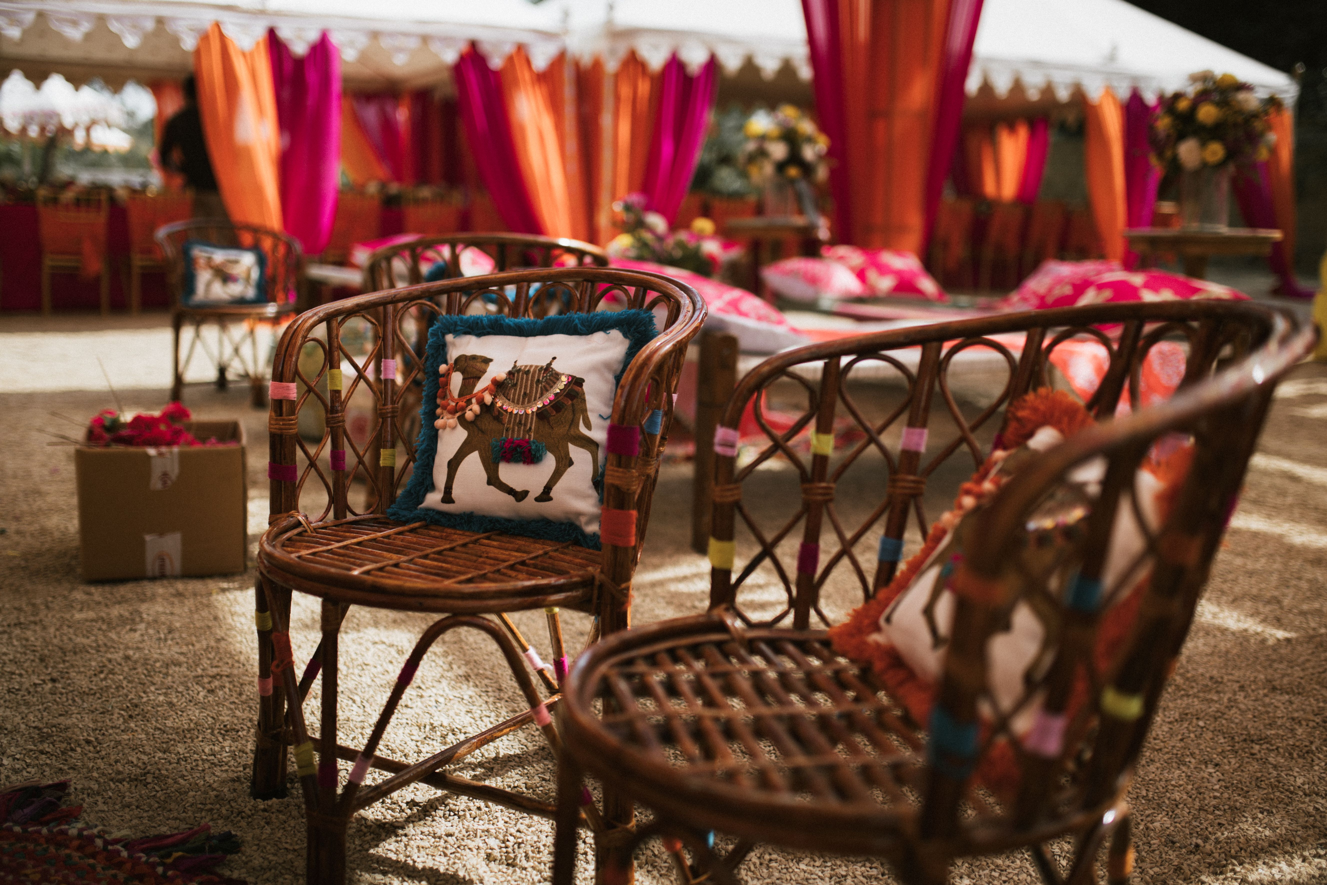 Colorful outdoor seating with cushions and decorative textiles
